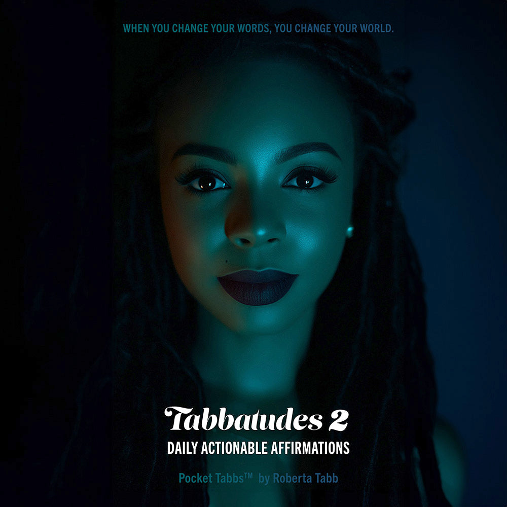 Book cover of 'Tabbatudes 2' with a woman's face illuminated in blue light on a dark background.