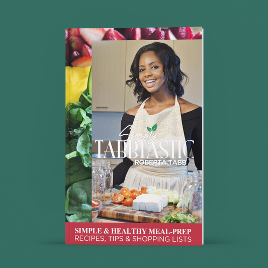 Cookbook cover with Roberta Tabb in an apron and kitchen setting, featuring the brand 'Simply Tabbtastic'.